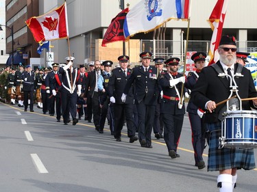 Participants take part in a march at Branch 564 of the Royal Canadian Legion Remembrance Day Service at the Memorial Park Cenotaph in Sudbury, Ont. on Friday November 11, 2022. John Lappa/Sudbury Star/Postmedia Network
