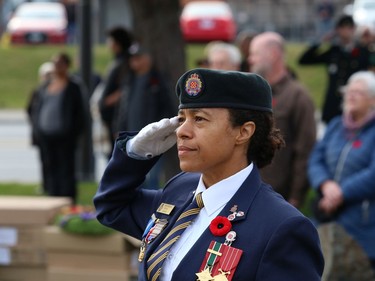 Jenny Bingham, of Branch 564 of the Royal Canadian Legion, salutes during a Remembrance Day Service at the Memorial Park Cenotaph in Sudbury, Ont. on Friday November 11, 2022. John Lappa/Sudbury Star/Postmedia Network