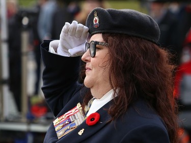 Branch 564 president Jennifer Huard salutes during a Remembrance Day Service at the Memorial Park Cenotaph in Sudbury, Ont. on Friday November 11, 2022. John Lappa/Sudbury Star/Postmedia Network