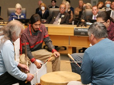 Elder Art Petahtegoose, left, and the Shaadaakii drum from Atikameksheng Anishnawbek perform the opening song at an inauguration ceremony for the new city council at Tom Davies Square on Thursday.