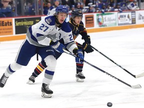 Quentin Musty, of the Sudbury Wolves, chases down the puck during OHL action against the Barrie Colts at the Sudbury Community Arena in Sudbury, Ont. on Friday November 18, 2022. John Lappa/Sudbury Star/Postmedia Network