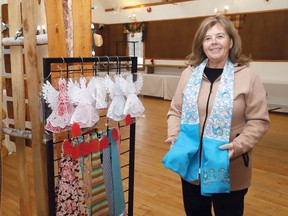 Show chair Elaine Hull displays Boa kitchen towels that will be for sale at the Penage Road Rendezvous Craft Show at the Penage Road Community Centre in Whitefish, Ont. on November 25 from 4 p.m. to 9 p.m. and November 26 from 10 a.m. to 4 p.m. A total of 30 vendors will be on hand showcasing woodworking, honey, maple syrup, embroidery, knitting, sewing and baking. John Lappa/Sudbury Star/Postmedia Network