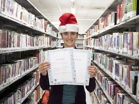 Lambton County Library's Vanitia Campbell, public services co-ordinator – youth programs and outreach, holds a pair of Santa letter templates in her hand. Children can use the templates to write letters to Santa Claus during the month of November.
Handout/Sarnia This Week