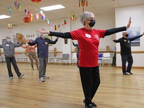Dianne Corbett, centre, leads Introduction to Tai Chi at the Canadian Tai Chi Academy Timmins Branch on Friday morning. Norman Leroux, to her right, has found that tai chi has allowed him to manage his heart condition, improve his fitness, balance, and concentration and promote relaxation. Beginners benefit very quickly and can be of all ages and fitness levels. The next introductory class starts in January.

NICOLE STOFFMAN/The Daily Press
