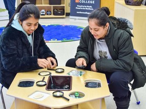 Manpreeet Kaur, left and Anisha Mengi explore the fossil replicas at the Early Childhood Educator Lab at Northern College on Monday. The two first-year ECE students attended the lab's grand opening, and look forward to practising what they are learning in class at the lab starting in January. Kindergarten students from area child-care centres will visit the lab and give the students a chance to interact with and teach children play-based learning.

Supplied