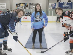 Amy Levesque of Habitat Interlude dropped a ceremonial puck with Crunch Assistant  Captain Collin Lapointe and Lumberjacks Captain Brayden Palfi at centre ice  at the Crunch-Lumberjack 
game.