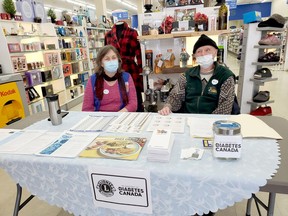 Beverly Magee and Findlay Barr of the Cochrane Lions Club were at Wallace Drug store last week to provide the public with information and to collect funds for Diabetes Canada