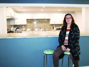 Beth Fitzpatrick, the new youth coordinator at the Get-A-Way Youth Centre, with the centre's new kitchen behind her.