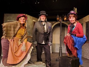 From left to right,  Marci Shelton (Mrs. Weedle), Allen Howard (Old Joe) and Veronica Jackson (Maud the Story Teller) are on the set of A Christmas Carol.  (Jim Konopetski/Special to the Sentinel-Review)