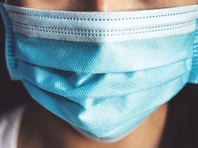 Public health officials are urging area residents to begin wearing masks again to help stop the spread of illness while a "triple threat" of respiratory viruses circulates in the province.

Rattankun Thongbun/Getty Images file photo