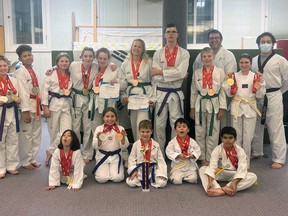 Nine of the KT Tae Kwon Do club's 14 competitors secured gold medal placements at the 21st Jung Ko Canadian Classic Tae Kwon Do tournament in October. Front row from left to right: Katherine Hawton, Gwyneth Taylor, Calum Thibodeau, William Hawton, Sharaav Bhise. Back row, from left to right: Head Instructor Rick Thibodeau, Jaxon Thorpe, Samuel Thompson, Danica Taylor, Kennedy Prescott, Zo Stewart, Sherra Westerveld, Wesley Ormsby-Greensides, Logan Morrison, Alex Hawton, Emma Riddell-Pruder, Master Jason Kim.