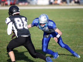 Jack Van Geel, who did double duty as quarterback and cornerback for the Royals Thursday, lines up a tackle in the second quarter as the Owen Sound District Wolves fell to the Saugeen District Royals 14-13 in the Bluewater Athletic Association senior football semi-final Thursday afternoon in Port Elgin. Greg Cowan/The Sun Times.