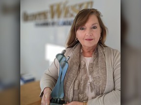 Suzanne Andrews, CEO at the Quinte West Chamber of Commerce, poses alongside her recently awarded James Gordon Carnegie Memorial Award from the Chamber Executives of Ontario Association. Submitted.