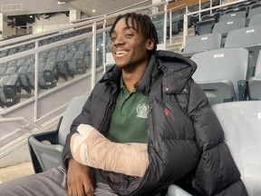 Kingston Frontenacs defenceman Maleek McGowan watches practice at the Leon’s Centre on Wednesday. He received a cut to his left arm and wrist in an Ontario Hockey League game in Kingston on Friday, Dec. 2.