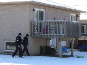 Greater Sudbury Police were on the scene of a residence Thursday in relation to a robbery at a Lorne Street store. An individual was taken into custody.