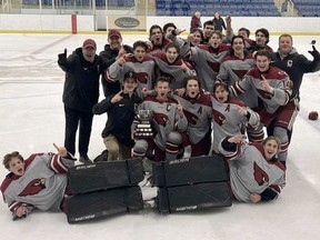 Players and staff from the St. Charles College Cardinals boys hockey team from Sudbury celebrate their championship at the Saint Michael Mustangs Tournament in Niagara Falls this past weekend. SCC went 6-1 at the event before defeating crosstown rival Horizon 3-1 in the final.