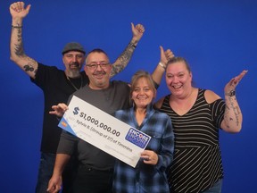 Sylvie Bureau and friends celebrate their $1-million prize from a Lotto 6/49 draw.