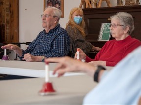 Canadian singer-songwriter Loreena McKennitt joins a music therapy session Tuesday at Knollcrest Lodge in Milverton. Also pictured are Knollcrest residents Ron Hyde and Trudy Watts. Chris MontaniniStratford Beacon Herald
