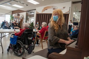 Canadian singer-songwriter Loreena McKennitt joins a music therapy session Tuesday at Knollcrest Lodge in Milverton. The Perth County long-term care home recently received a $9,000 grant to get the program up and running, part of which came from the Irene McKennitt Fund for Nursing Excellence. Loreena established the fund in her mother's name through the Stratford Perth Community Foundation in 2011. Chris Montanini/Stratford Beacon Herald