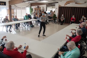Music therapist Karis Rovillos leads a session dedicated to Christmas carols at Knollcrest Lodge on Tuesday. The Perth County long-term care home recently received a $9,000 grant to get the program up and running. Chris Montanini/Stratford Beacon Herald