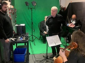 Ballinran Entertainment president Craig Thompson directs a recording of cellist Gwendolyn Nguyen for his Magic Windows experience, a unique sound and light show that will be part of the Lights on Stratford festival.  (Contributed photo)