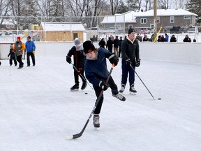 Local youngsters test out the ice during the grand opening of the new outdoor rink at Robinson Playground in Sudbury, Ontario on Saturday, December 17, 2022.