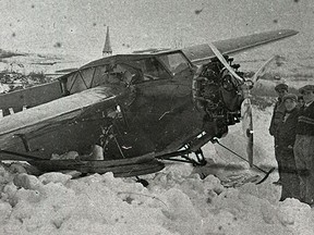 According to December 31, 1931, issue of Peace River Record this Fokker Universal G-CAIV, flown by John Bythell, met with misfortune – being snatched by rough Peace River ice. The mail plane, on way to Keg River and Fort Vermilion with two passengers, was taking off south of Peace River railway bridge, when right wing tip succumbed to result of thaw and refreezing of river. Passengers Mrs. J.B. Kemp and daughter were unharmed – only disappointed in first airplane ride. (Note steeple of Our Lady of Peace Church in background).