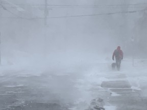 Friday's winter storm continued Saturday with high winds and snow along with frigid temperatures. Peter Hendra/The Whig-Standard