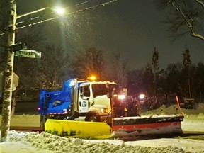 A Belleville municipal snowplow operator clears Bridge Street East around 5 a.m. Dec. 23 after the region was swamped with 15 cm of snow. A further four to six centimetres of snow was forecast for Friday with snow ending around midnight. DEREK BALDWIN FILE