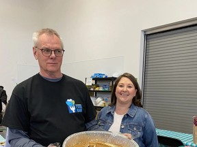 Staff pose with pancakes at the Fort Saskatchewan Food Bank, located at 11226 88 Avenue in Fort Saskatchewan, during their volunteer appreciation pancake breakfast. Photo by Gale Katchur, supplied.