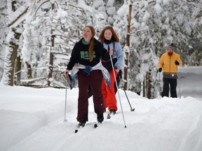 Natalie Vasiga, front, Jane Murray and Dan Murray ski at the Owen Sound Cross Country Ski Club's Massie Hills trails south of Owen Sound on Wednesday, December 28, 2022.