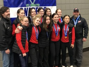 The Chatham U16 Thunder celebrate winning the St. Marys Ringette Association tournament in St. Marys, Ont., on Sunday, Dec. 11, 2022. The team members are, front row, left: Claire Forshee, Grace Norris, Natalie Haggerty, Kate Thompson and Lily Allado. Back row: coach John Thompson, Mallarie Badder, Emma Winkler, Lindsey Durocher, Olivia Wilson, Brianna Badder and coach Paul Norris. Brooke Howe is absent. (Contributed Photo)