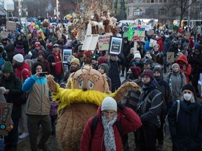 Activists protest the United Nations Biodiversity Conference (COP15) during the March for Biodiversity for Human Rights in Montreal on December 10, 2022.