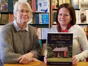 The Ginger Press's 37th annual authors' open house in Owen Sound, Ont. on Saturday, Dec. 10, 2022 showcased new books including this one. Author Gwen Harris, left, wrote The Flemings of Derby Township: A Family History with Ruth (Fleming) Larmour, mother of Heather Ross, right. (Scott Dunn/The Sun Times/Postmedia Network)