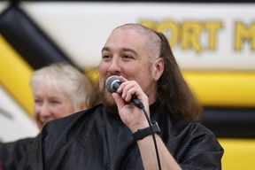Dan Tulk speaks while getting shaved bald at Fort McMurray Composite School after $13,000 was raised for local charities on December 15, 2022. Photo by Momin Syed/FMPSD