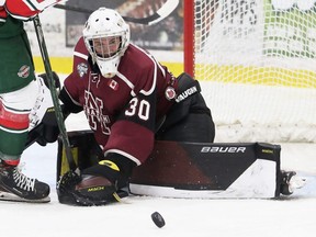 Chatham Maroons goalie Luka Dobrich reaches for a loose puck in the third period against the St. Marys Lincolns at Chatham Memorial Arena in Chatham, Ont., on Sunday, Dec. 11, 2022. Mark Malone/Chatham Daily News/Postmedia Network