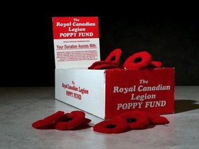 A Royal Canadian Legion poppy donation box. MIKE DIBATTISTA/Postmedia File
