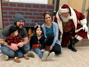 The Kelly family – Robbie, left, with Arwen on his lap, Sam, and Nicole – were joined by Sensitive Santa at the Sensity facility on Saturday where families of special needs children had an unusual opportunity to get a personalize family visit with St. Nick.