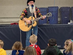 Local celebrity, family entertainer and musician, Andy Forgie performs at Prince of Wales School for a gym full of young students as part of the Quinte Arts Council's Artists in Schools program. KODIE TRAHAN-GUAY PHOTO