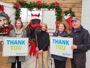 Pictured from left at the Carousel Canada Equine Riding Centre where Betsy keeps her horse in Trenton is Shannon Coull, executive director of the PECMH Foundation; King Arthur, thoroughbred; Betsy Sinclair; Nancy Parks, Back the Build campaign co-chairperson and David Smith, past president of the Rotary Club of Wellington Foundation. BRIAR BOYCE