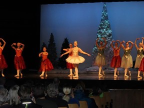 Quinte Ballet School of Canada's perfroamcne of The Nutcracker put Ukrainian student Leah Hagan front and centre innwhite during the curtain calls for the Holiday Dance show Sunday. The talented teen sparkled as the Sugar Plum Fairy. JACK EVANS PHOTO