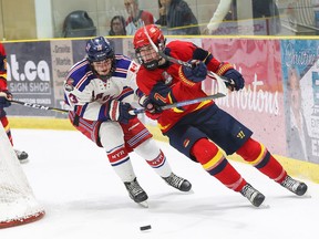 Wellington Dukes Connor Hunt tries to keep the puck from North York Rangers Owen Ibbotson during Ontario Junior Hockey Leageu action November 25 at the Wellington and District Community Centre. The Dukes hammered the Rangers 11-2 Wednesday in North York to run their points streak to 13 games. ED MCPHERSON/OJHL IMAGES