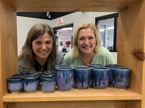 Mary McDonald (left) and Louise Harvey are among nearly 40 potters taking part in the Brantford Potters Guild annual sale at the Woodman Community Centre on Grey Street. The sale began Friday and continues Saturday from 10 a.m. to 5 p.m. and Sunday from noon to 4 p.m. Vincent Ball