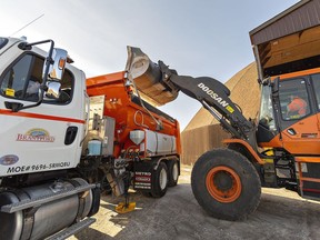 A City of Brantford snowplow truck is loaded with salt on Wednesday in preparation for a storm that will bring rain, icy road surfaces and snow beginning late Thursday.