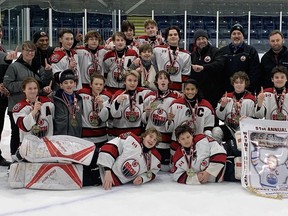 The Brantford Minor Hockey Association's under-14 'AA' team captured its division championship on Friday at the Wayne Gretzky Sports Centre during the 51st annual Wayne Gretzky International Tournament.