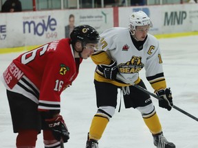 Lucas Culhane and Sean James await a faceoff during the Braves-Bears game in Brockville on Friday, Dec. 16. The Smiths Falls captain and CCHL scoring leader had two goals on the night, but Culhane scored the winner in OT to give the Braves a 3-2 victory.
Tim Ruhnke/The Recorder and Times