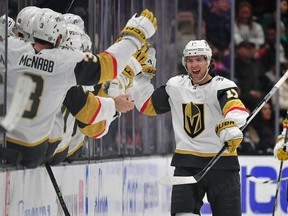 Ben Hutton is congratulated by his Vegas teammates after the Golden Knights defenceman and Prescott-area native scores his first goal of the season to tie their game in Anaheim on Wednesday, Dec. 28. The Ducks went on to win in a shootout.
Gary A. Vasquez/USA TODAY Sports