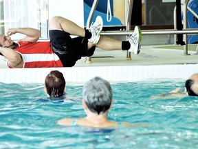 Aqua fit classes are among the popular pool activities at the Chatham-Kent Family YMCA. Chris Mahoney is seen in this file photo from 2012, leading an aqua fit class. File photo/Postmedia