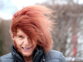 The winds were howling across Chatham-Kent in early January 2022 - not as bad as this past weekend's winter storm - but it but it wasn't bothering Constance Ellwood who was spotted enjoying the wind swept feeling while out in north Chatham. PHOTO Ellwood Shreve/Chatham Daily News/Postmedia