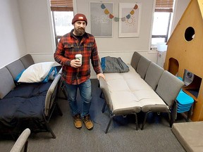 Dan Christiaans, associate pastor at Maple City Baptist Church, shows one of the halls that was set up in the Chatham church to provide shelter for those stranded during Friday's massive winter storm. (Ellwood Shreve/Chatham Daily News)